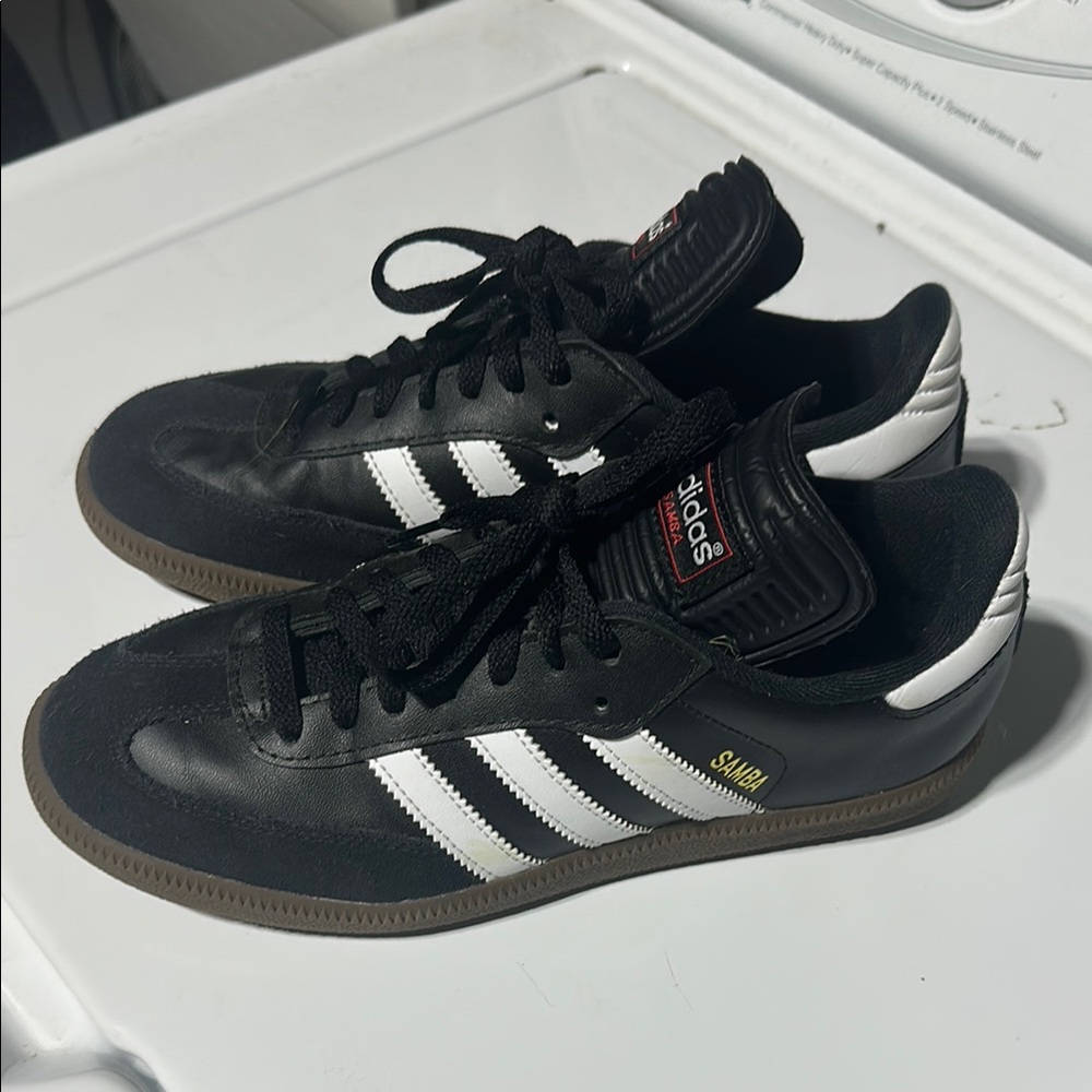 Adidas Black and White Sneakers with Iconic Stripes